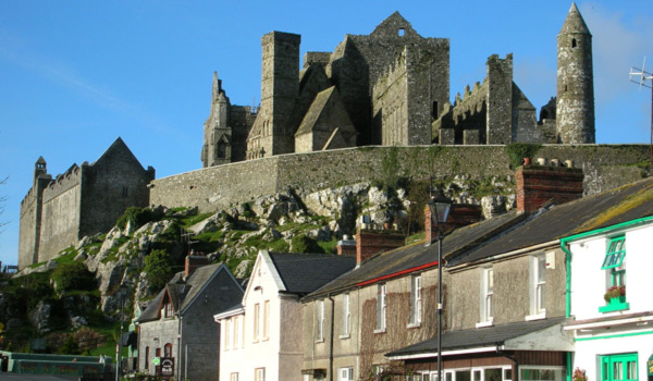 The Rock of Cashel Medieval Fortress rises behind the Village.