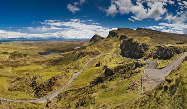 A winding mountain road on the stunning Isle of Skye.