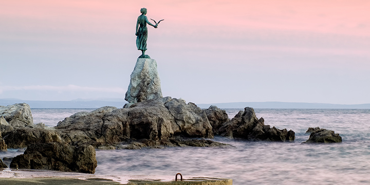This historic statue on the Adriatic coast is a symbol of touristic town Opatija in Croatia.