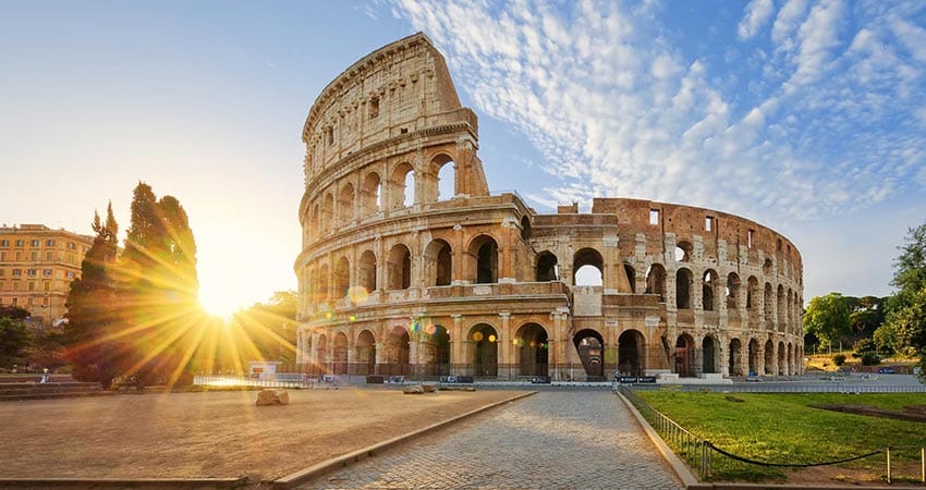 Profile view of the Collosseum in Rome during sunset