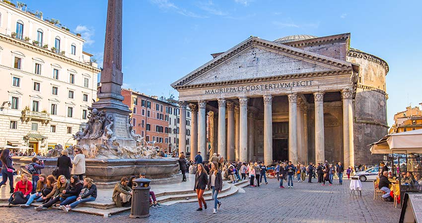 The Pantheon temple with visiting tourists during daylight