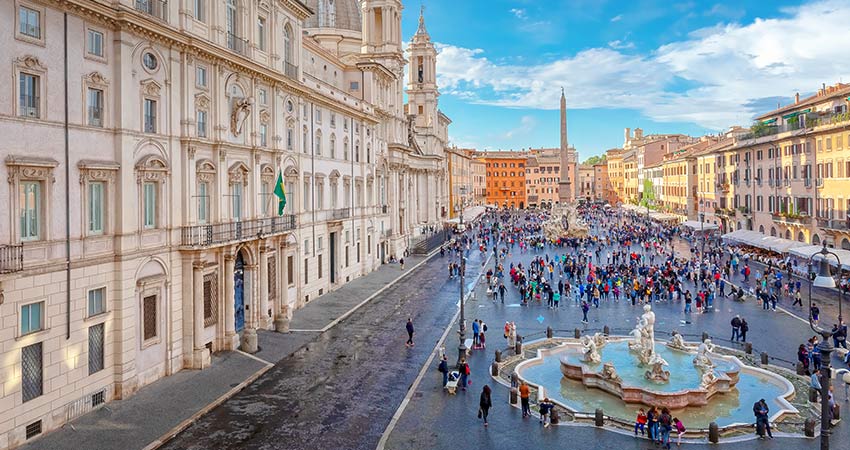 Aerial view of the famous Piazza Navona square in Rome with visiting tourists
