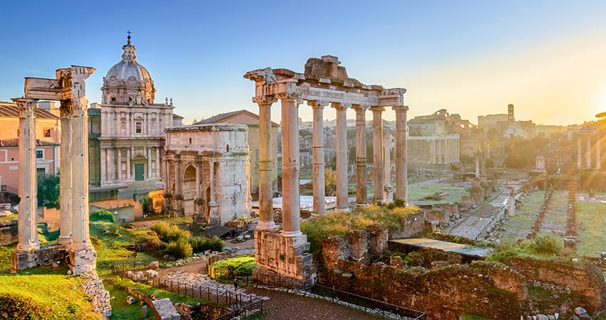 Aerial view of the Roman Forum ruins during sunset