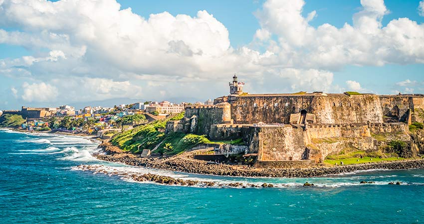 Panoramic landscape of historical castle El Morro along the coastline, San Juan, Puerto Rico 