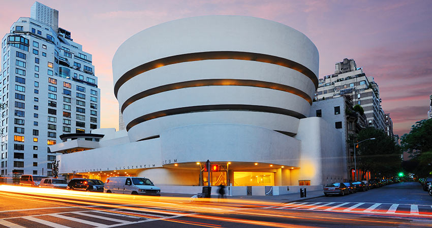 Evening shot of the Guggenheim Museum on 5th Ave in New York City designed by famed architect Frank Lloyd Wright